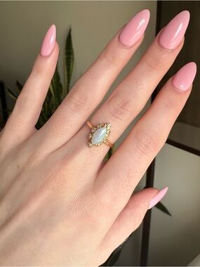 14K Yellow Gold Women's Diamond/Opal Ring
1 Carat Opal Size 6